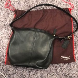 EUCAuthentic black coach bucket bag with dust bag